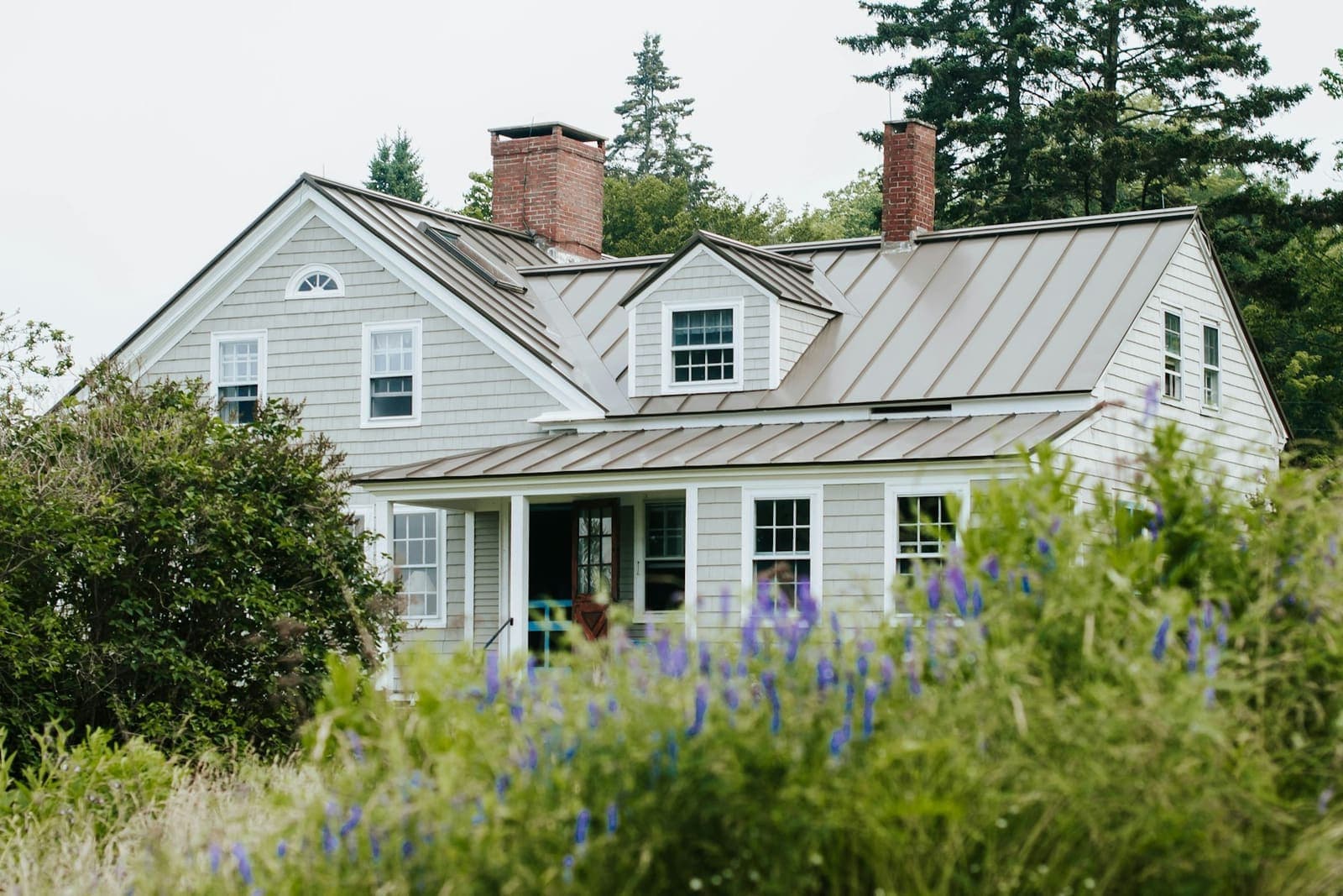 Suburban home after roof and gutter work