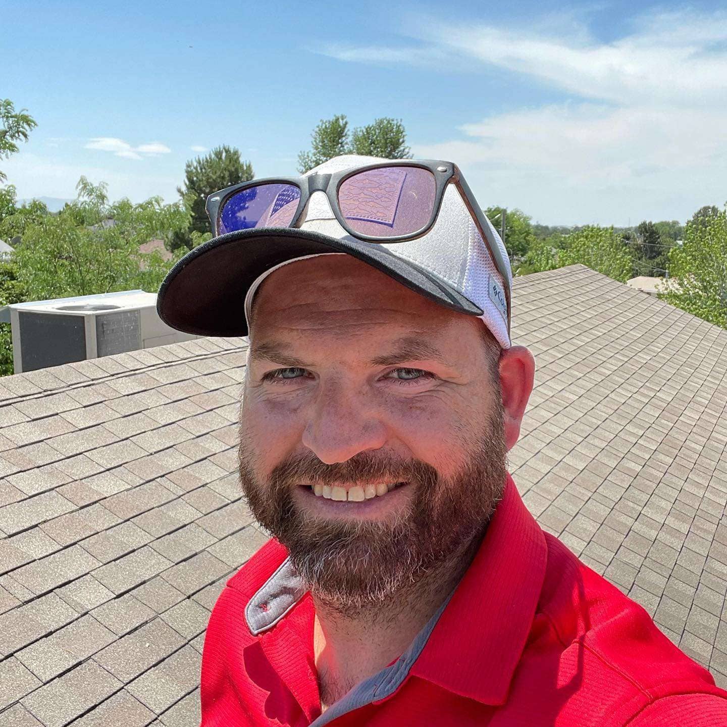 Matt with Redline Roofing on a customer's shingle roof in Northern Utah