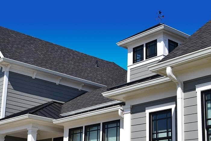 New construction home with a fresh shingle roof