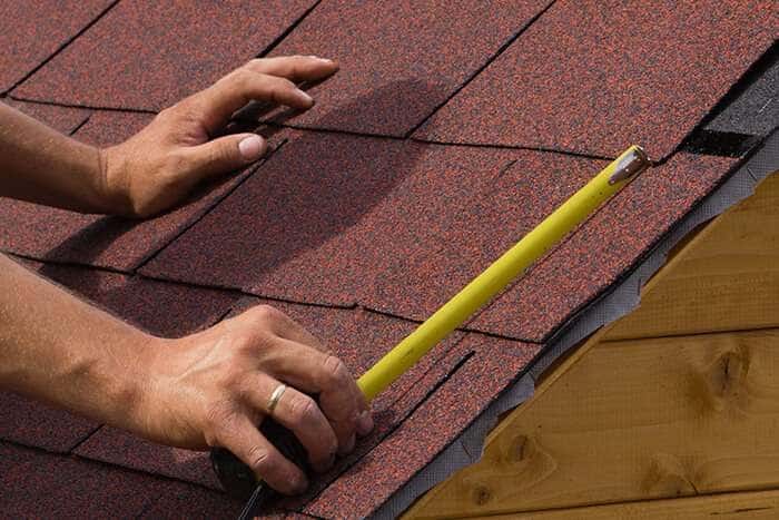 Measuring shingles for a roof repair