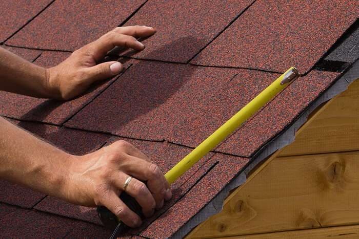 Repairing shingles on a Salt Lake City roof